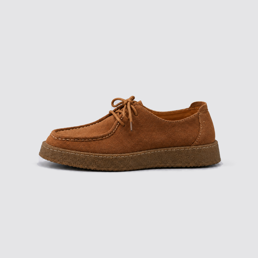Brown shoe, side view, background #e5e5e7