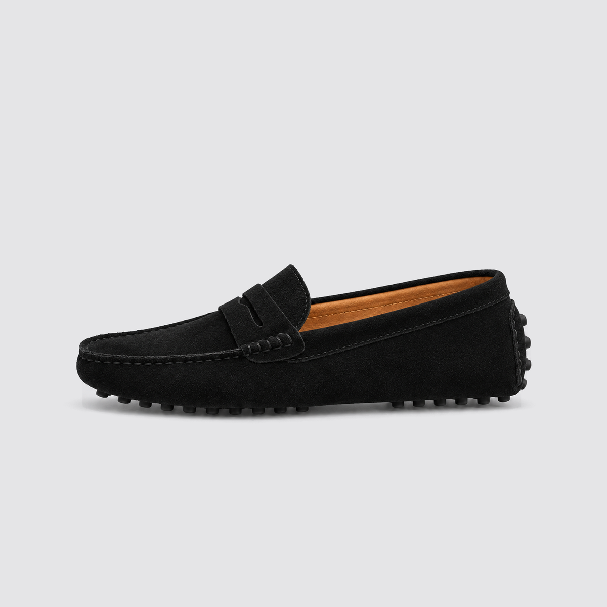 Black loafer, side view, background #e5e5e7