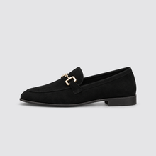 Black loafer, side view, background #e5e5e7