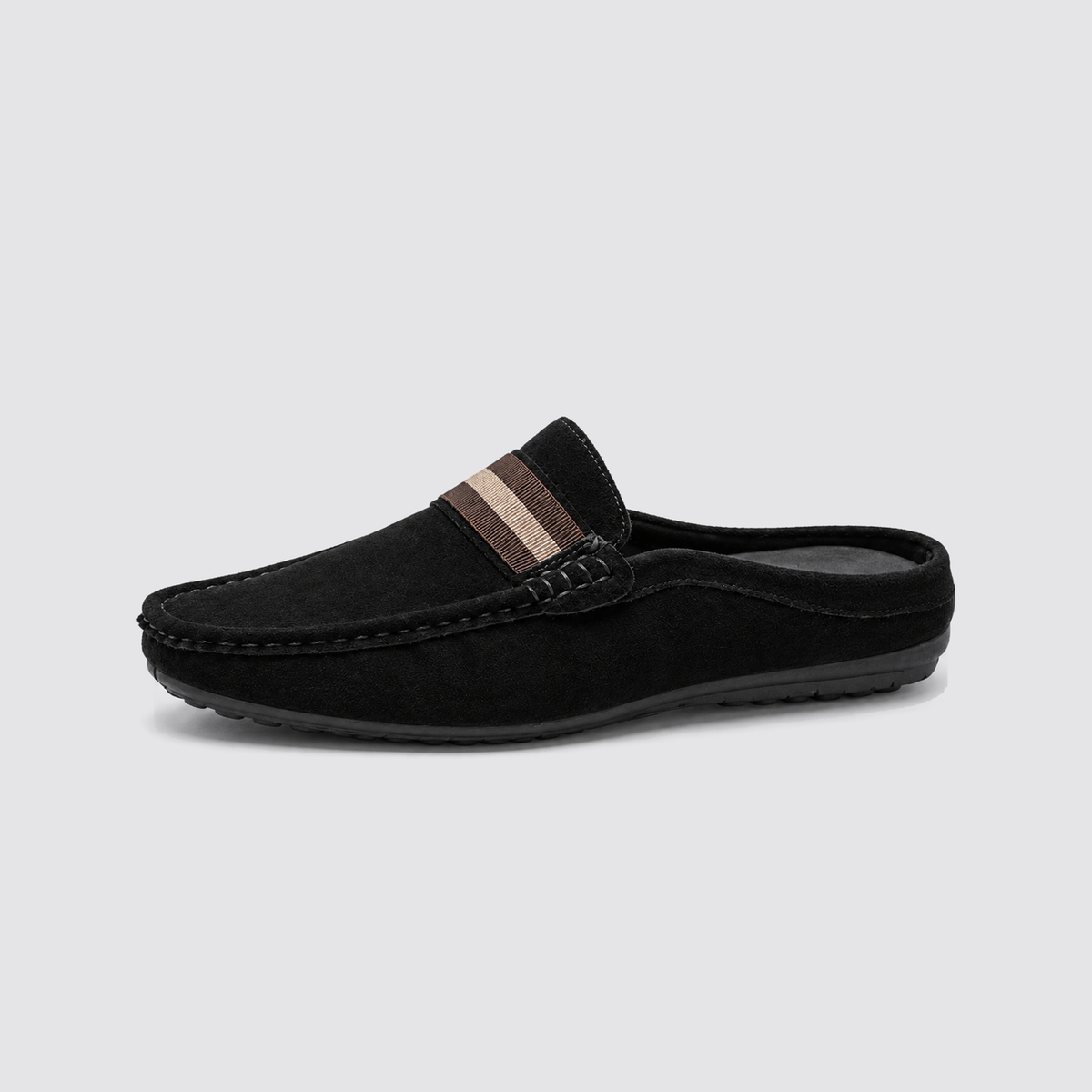 Black slip-on mule side profile