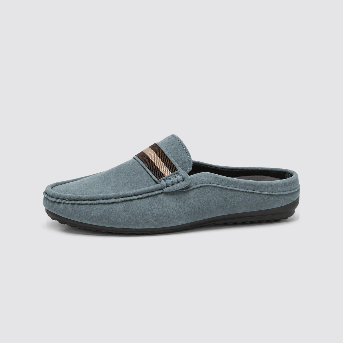 Blue slip-on mule side profile