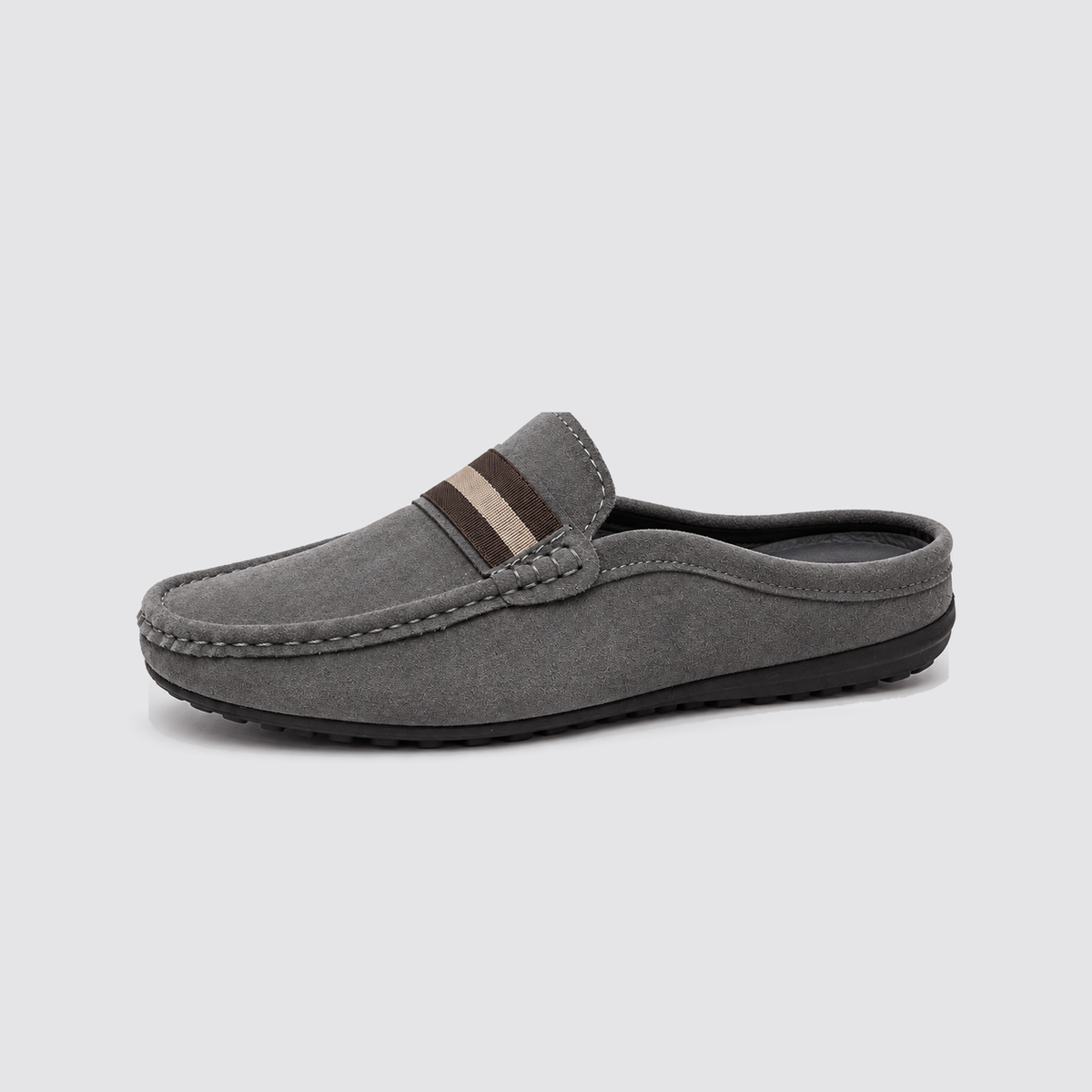 Grey slip-on mule side profile