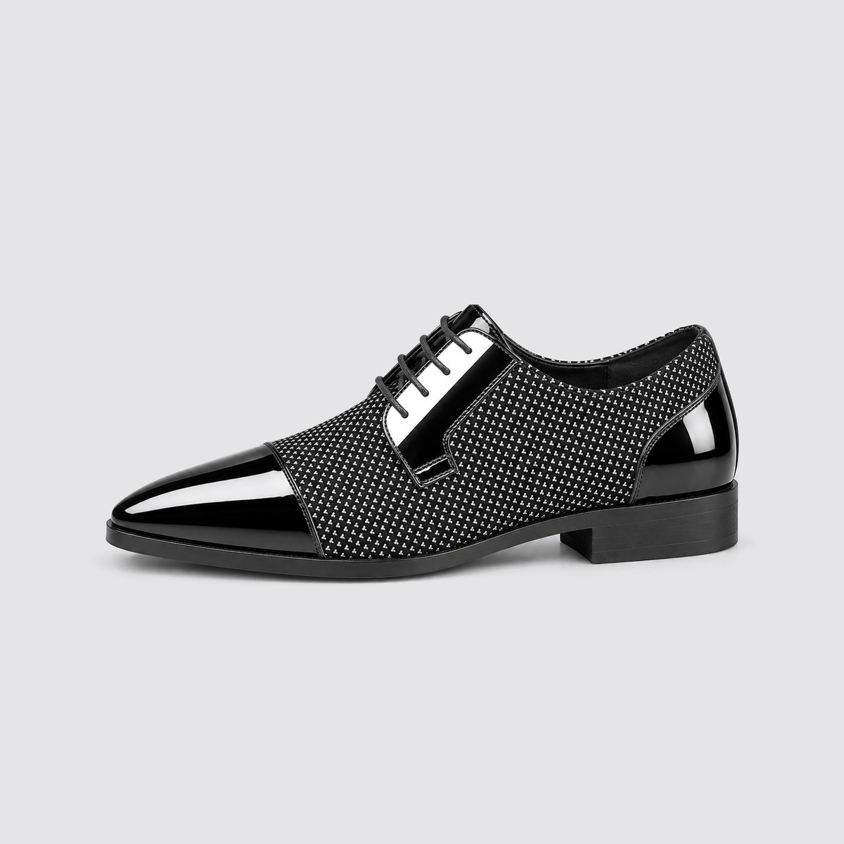 Grey patent dress shoe side profile